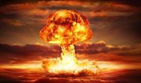 testing of atomic bomb over ocean with mushroom clouds - red destroy
